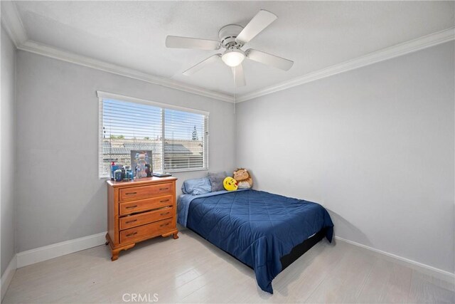 2 Corte Lateuza, Lake Elsinore, CA 92532 - bedroom with ornamental molding, baseboards, light wood finished floors, and a ceiling fan