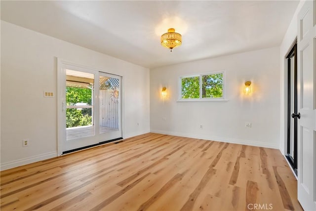 3500 Colima Rd, Atascadero, CA 93422 - empty room featuring plenty of natural light, light wood finished floors, and baseboards