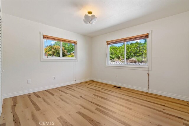 3500 Colima Rd, Atascadero, CA 93422 - unfurnished room featuring plenty of natural light, baseboards, and light wood-style flooring