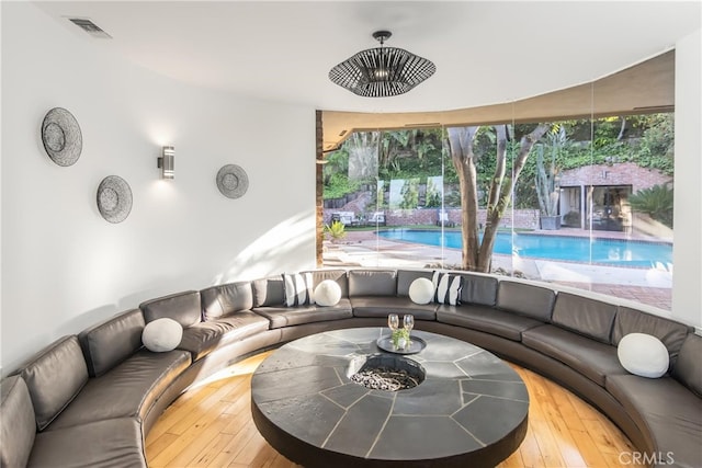 3828 Alomar Dr, Sherman Oaks, CA 91423 - sunken living room with hardwood / wood-style floors