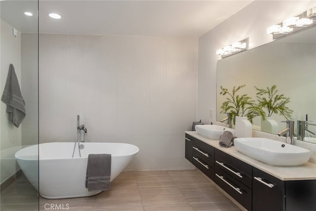 3828 Alomar Dr, Sherman Oaks, CA 91423 - full bathroom with a freestanding bath, double vanity, and recessed lighting