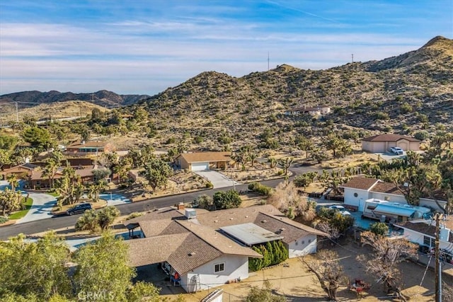 56772 Kismet Rd, Yucca Valley, CA 92284 - drone / aerial view of a mountainous background