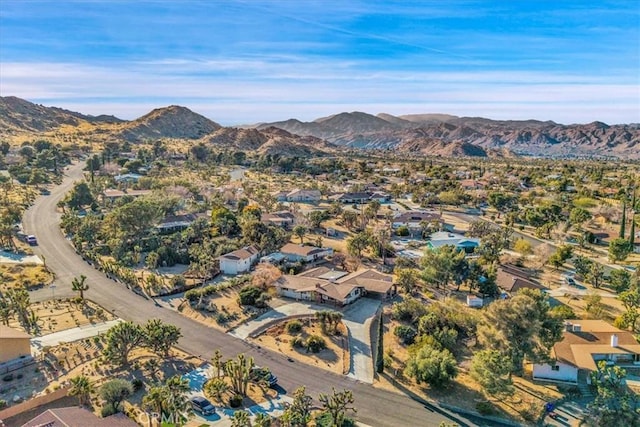 56772 Kismet Rd, Yucca Valley, CA 92284 - aerial view of property and surrounding area with mountains and nearby suburban area