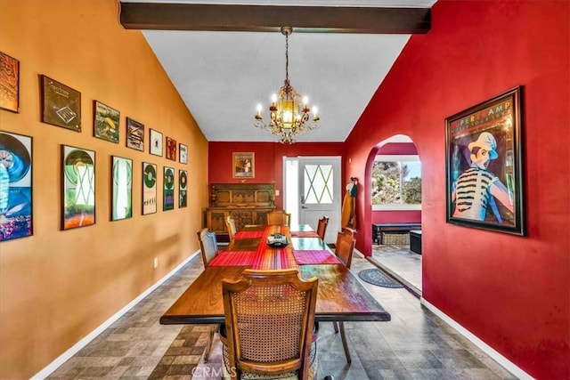 56772 Kismet Rd, Yucca Valley, CA 92284 - dining room with beamed ceiling, baseboards, a chandelier, arched walkways, and high vaulted ceiling