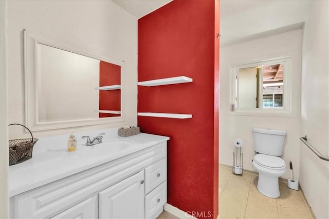 56772 Kismet Rd, Yucca Valley, CA 92284 - bathroom with vanity, baseboards, and toilet