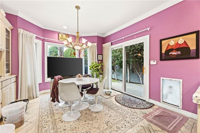 4960 Densmore Ave, Encino, CA 91436 - dining space with baseboards, a chandelier, ornamental molding, and wood finished floors