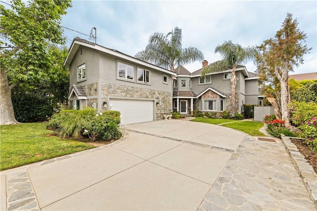 4960 Densmore Ave, Encino, CA 91436 - view of front facade with stone siding, stucco siding, a garage, a chimney, and concrete driveway