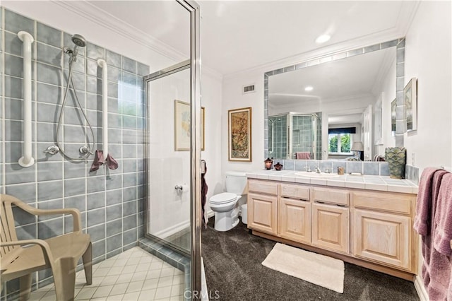 4960 Densmore Ave, Encino, CA 91436 - bathroom featuring ornamental molding, a shower stall, vanity, toilet, and tile patterned floors