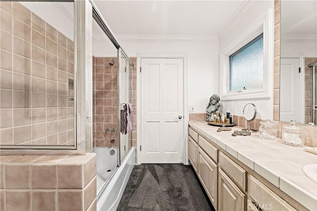 4960 Densmore Ave, Encino, CA 91436 - bathroom with vanity, shower / bath combination with glass door, and crown molding