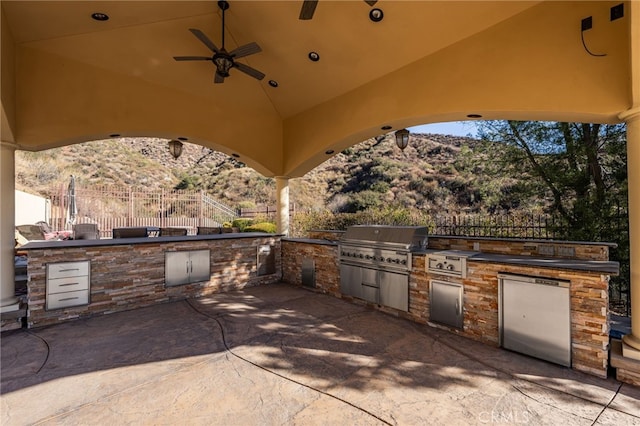 475 W 26th St, Upland, CA 91784 - view of patio / terrace featuring an outdoor kitchen, a grill, fence, and ceiling fan
