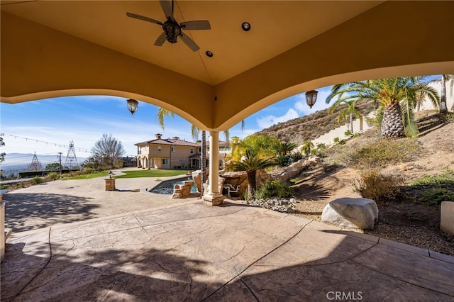 475 W 26th St, Upland, CA 91784 - view of patio featuring a ceiling fan and a mountain view