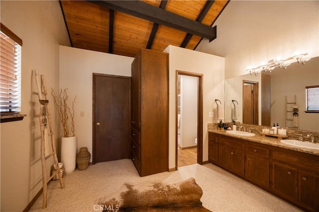 43620 Colusa Dr, Big Bear Lake, CA 92315 - bathroom with wooden ceiling, beamed ceiling, high vaulted ceiling, double vanity, and toilet