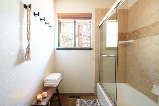 43620 Colusa Dr, Big Bear Lake, CA 92315 - full bathroom with combined bath / shower with glass door, baseboards, and wood finished floors
