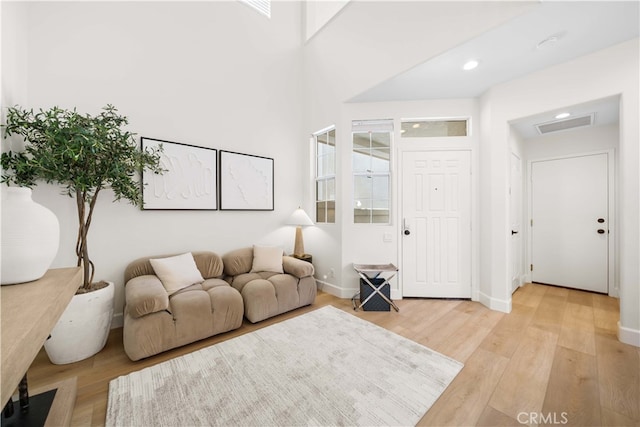 59 Cape Victoria, Aliso Viejo, CA 92656 - living room featuring light wood-style floors, baseboards, and recessed lighting