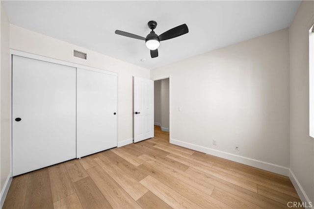 59 Cape Victoria, Aliso Viejo, CA 92656 - unfurnished bedroom featuring baseboards, light wood-style flooring, and a closet