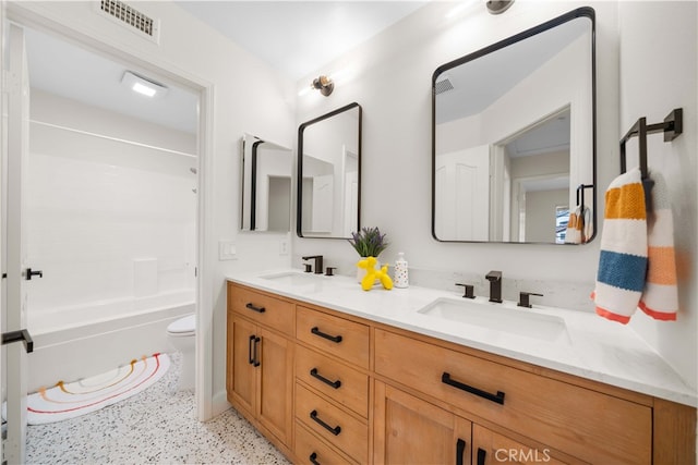 59 Cape Victoria, Aliso Viejo, CA 92656 - full bathroom with toilet, double vanity, shower / bathtub combination, and speckle patterned floor