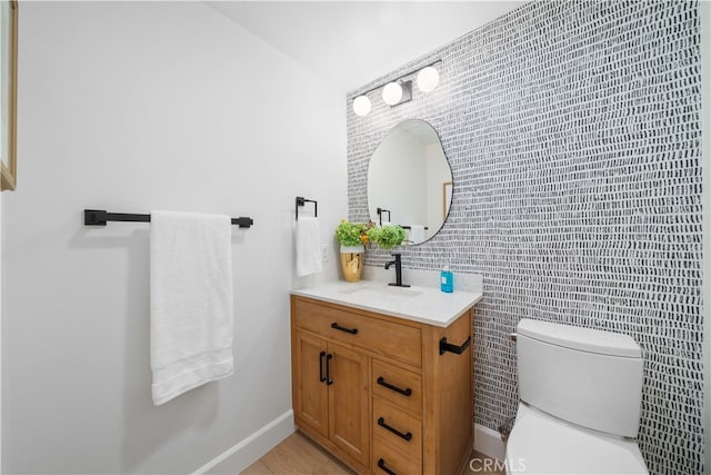 59 Cape Victoria, Aliso Viejo, CA 92656 - bathroom with toilet, tile walls, vanity, and baseboards