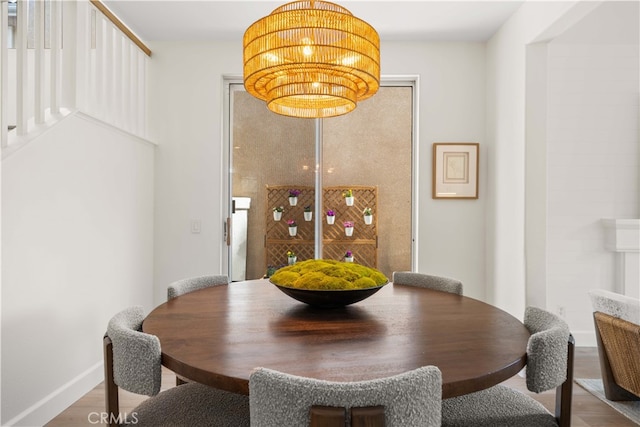 59 Cape Victoria, Aliso Viejo, CA 92656 - dining area with wood finished floors, a chandelier, baseboards, and stairs