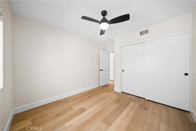 59 Cape Victoria, Aliso Viejo, CA 92656 - unfurnished bedroom with light wood-type flooring, baseboards, a closet, and a ceiling fan
