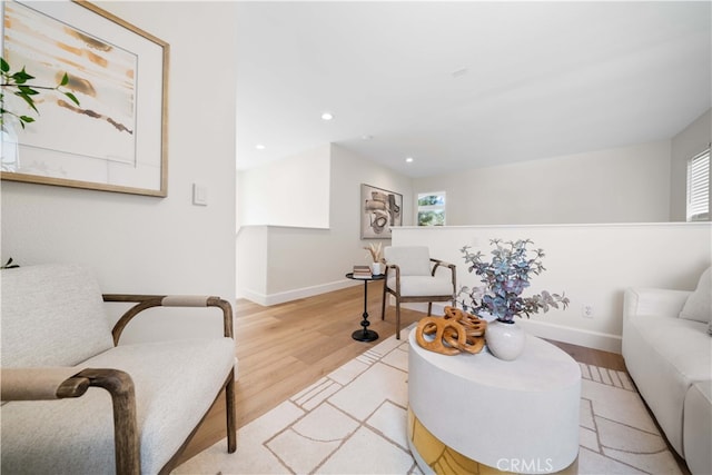 59 Cape Victoria, Aliso Viejo, CA 92656 - living room with light wood finished floors, baseboards, and recessed lighting