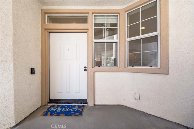 59 Cape Victoria, Aliso Viejo, CA 92656 - doorway to property with stucco siding