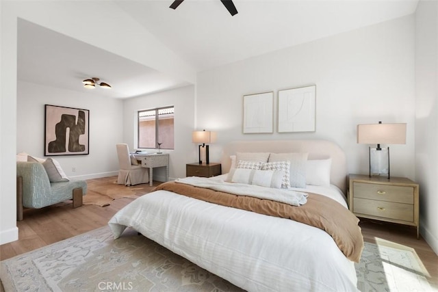 59 Cape Victoria, Aliso Viejo, CA 92656 - bedroom featuring wood finished floors, vaulted ceiling, and ceiling fan
