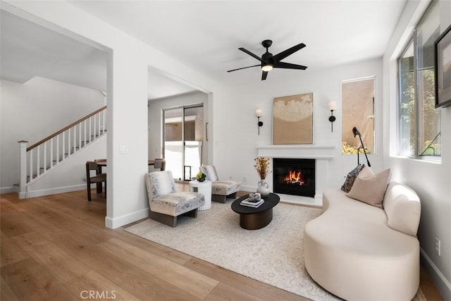 59 Cape Victoria, Aliso Viejo, CA 92656 - living area with stairs, wood finished floors, and healthy amount of natural light