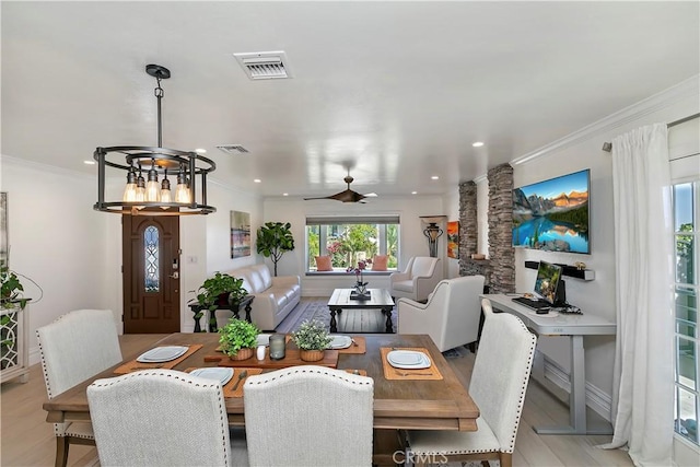 2546 N Orange Hill Ln, Orange, CA 92867 - dining space with recessed lighting, crown molding, light wood-type flooring, ornate columns, and ceiling fan