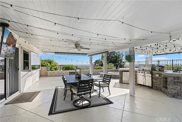 2546 N Orange Hill Ln, Orange, CA 92867 - view of patio with area for grilling, a fenced backyard, a grill, outdoor dining space, and ceiling fan