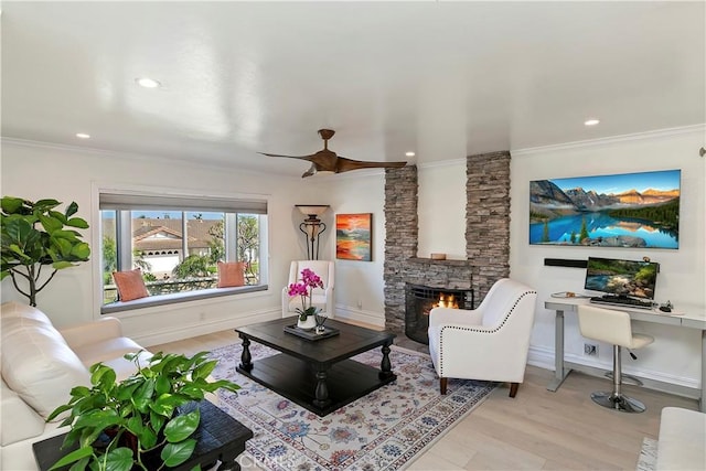 2546 N Orange Hill Ln, Orange, CA 92867 - living room with a fireplace, light wood-style floors, ceiling fan, recessed lighting, and ornamental molding