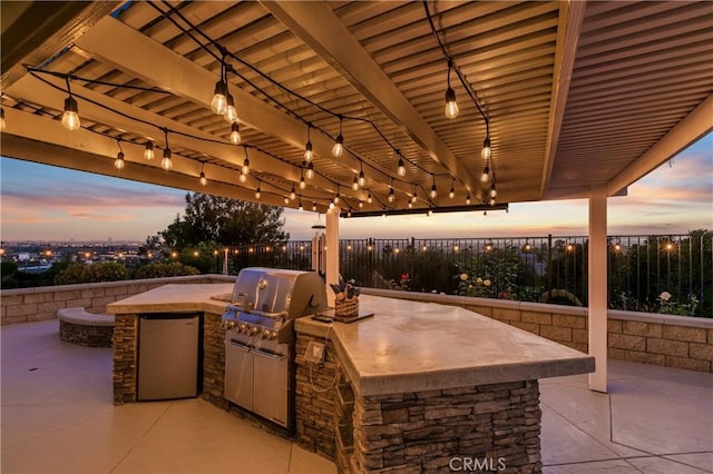 2546 N Orange Hill Ln, Orange, CA 92867 - patio terrace at dusk featuring area for grilling and a fenced backyard