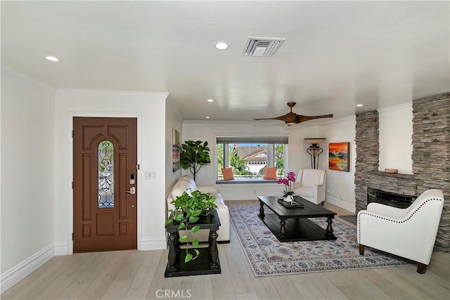 2546 N Orange Hill Ln, Orange, CA 92867 - living room with wood finished floors, ceiling fan, baseboards, crown molding, and recessed lighting