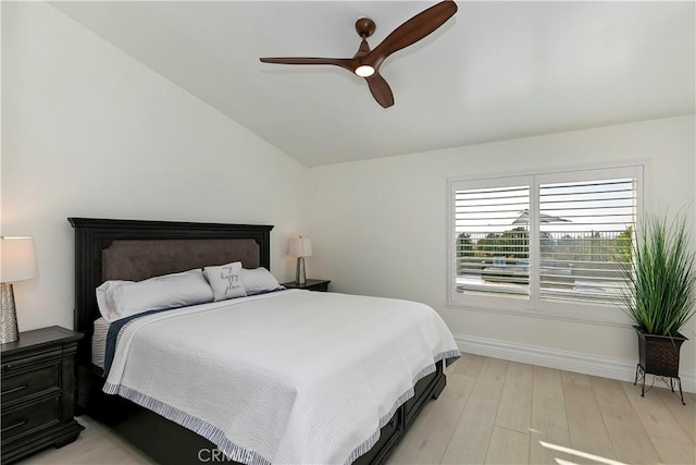 2546 N Orange Hill Ln, Orange, CA 92867 - bedroom with vaulted ceiling, baseboards, light wood-style floors, and a ceiling fan