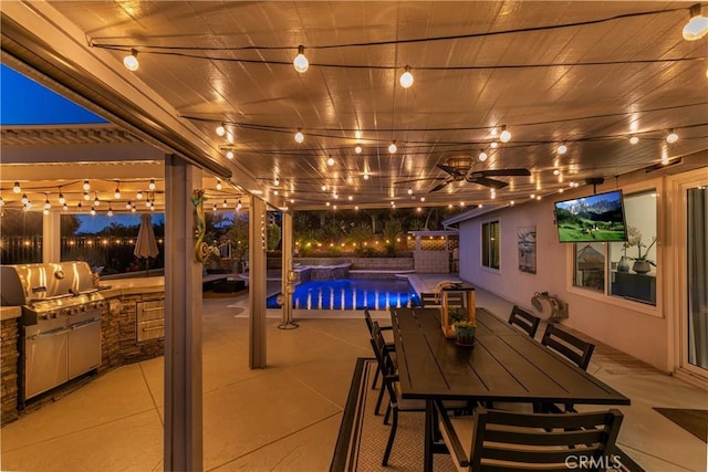 2546 N Orange Hill Ln, Orange, CA 92867 - patio at twilight with area for grilling, a ceiling fan, outdoor dining area, a fenced backyard, and a pool with connected hot tub