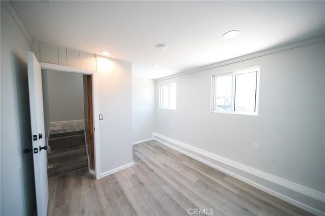 1336 W 118th St, Los Angeles, CA 90044 - spare room with baseboards, light wood finished floors, and recessed lighting