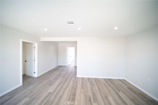 1336 W 118th St, Los Angeles, CA 90044 - spare room with light wood-style floors, baseboards, and recessed lighting