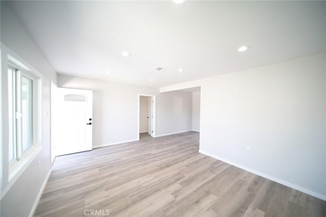 1336 W 118th St, Los Angeles, CA 90044 - unfurnished room featuring baseboards, light wood-style flooring, and recessed lighting