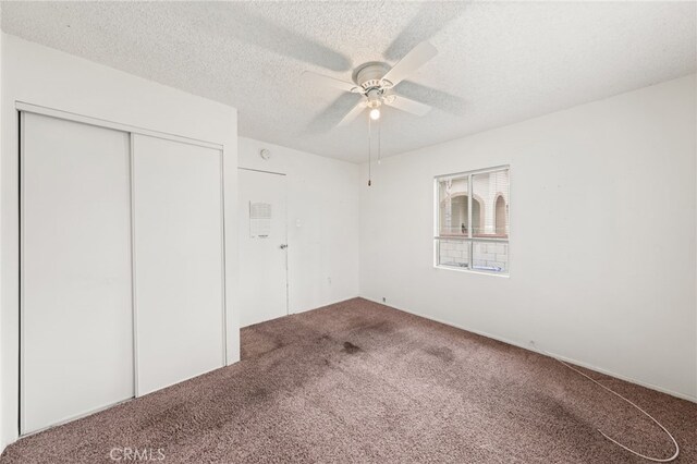 368 W St, Upland, CA 91786 - unfurnished bedroom featuring carpet floors, a closet, a textured ceiling, and ceiling fan