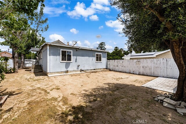 368 W St, Upland, CA 91786 - rear view of property with a fenced backyard