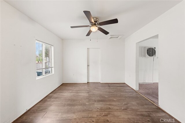 368 W St, Upland, CA 91786 - spare room featuring ceiling fan, wood finished floors, and attic access