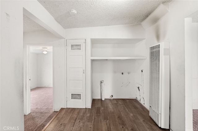 368 W St, Upland, CA 91786 - laundry room featuring a heating unit, hookup for a washing machine, a textured ceiling, and wood finished floors