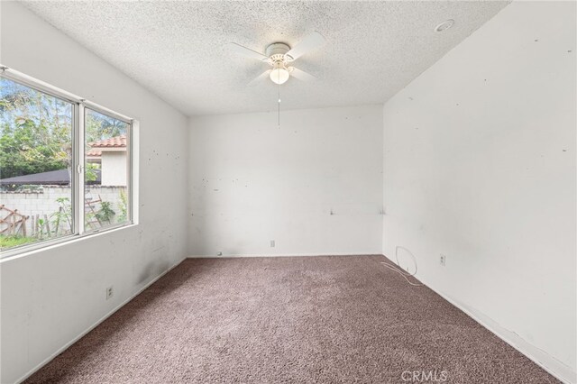 368 W St, Upland, CA 91786 - carpeted empty room featuring a textured ceiling and a ceiling fan