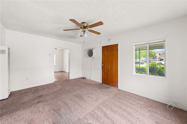 368 W St, Upland, CA 91786 - unfurnished room with a heating unit, a ceiling fan, carpet flooring, and a textured ceiling