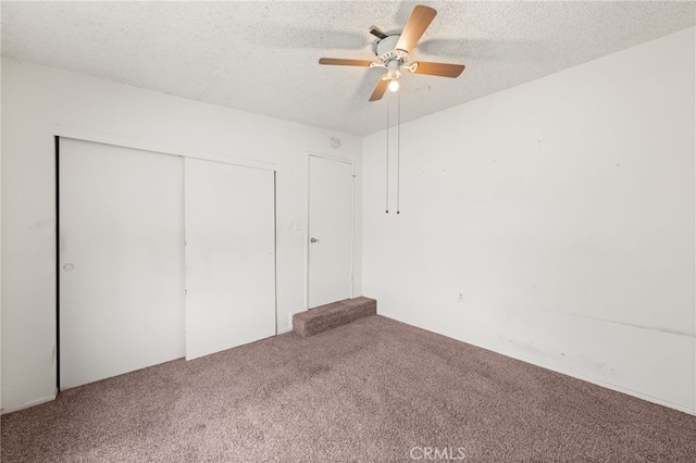 368 W St, Upland, CA 91786 - unfurnished bedroom with carpet floors, a textured ceiling, a closet, and a ceiling fan