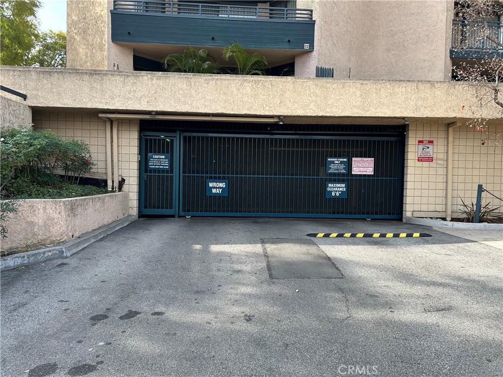 4499 Via Marisol Unit 327, Los Angeles, CA 90042 - garage with a gate