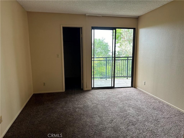 4499 Via Marisol Unit 327, Los Angeles, CA 90042 - spare room featuring carpet flooring and a textured ceiling