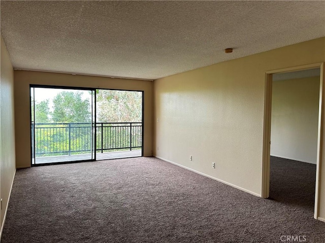 4499 Via Marisol Unit 327, Los Angeles, CA 90042 - empty room featuring carpet floors and a textured ceiling