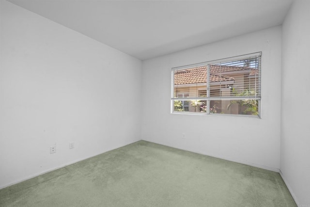 empty room with carpet and plenty of natural light