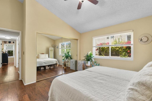 2610 Hillridge Ln, Spring Valley, CA 91977 - bedroom with wood finished floors, a closet, vaulted ceiling, a textured ceiling, and ceiling fan