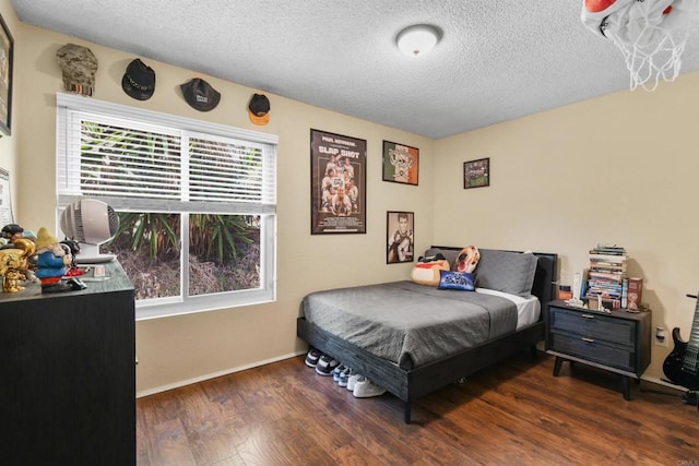 2610 Hillridge Ln, Spring Valley, CA 91977 - bedroom featuring wood finished floors, multiple windows, and a textured ceiling